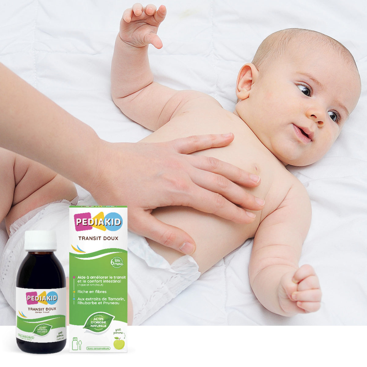 PEDIAKID Transit Doux sirop 125 ml - bebeluș căruia i se masează blând burtica, alături de flaconul și cutia produsului